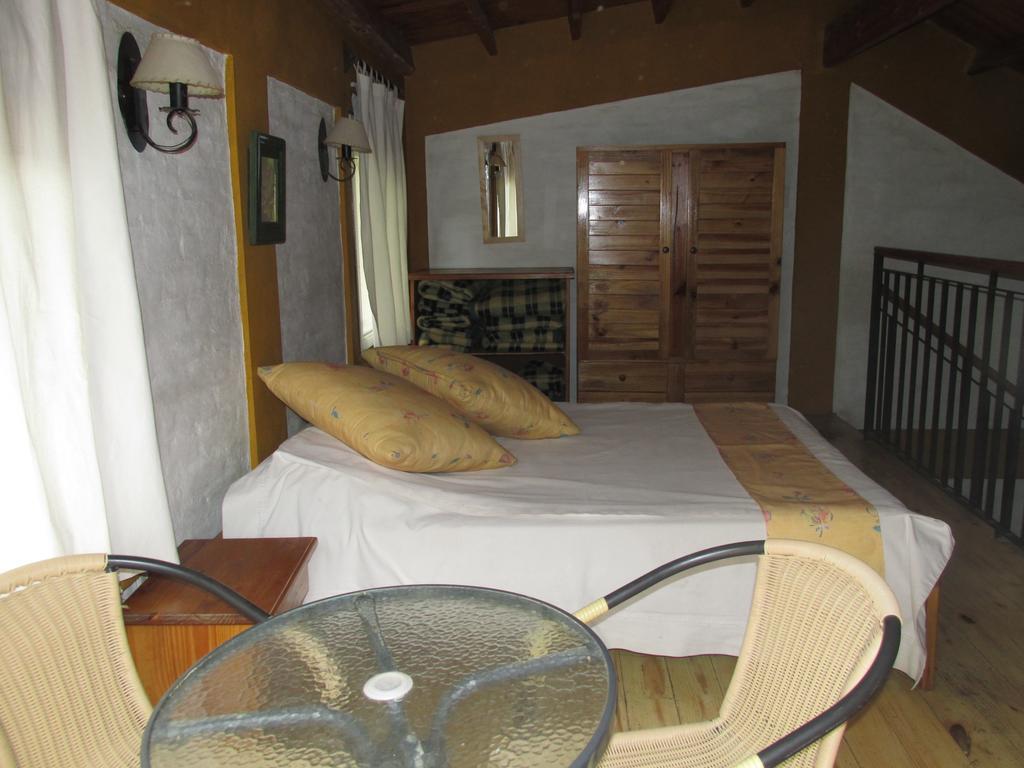 Cabañas Los Arreboles Potrerillos Habitación foto